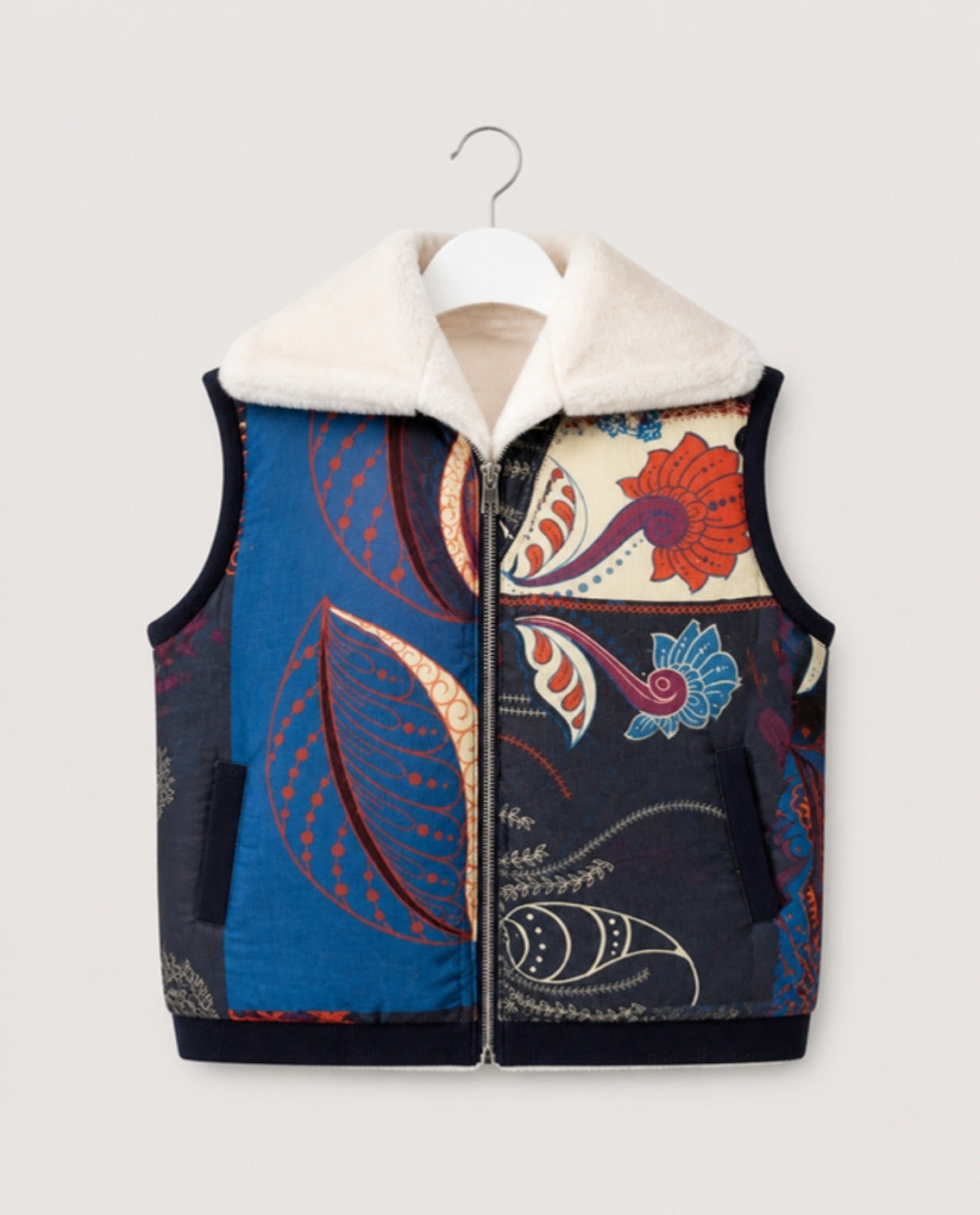 Image of Woven Tales Vest in blue by Callista, front view on an invisible mannequin | فيست ووفن تيلز أزرق من كاليستا، صورة أمامية