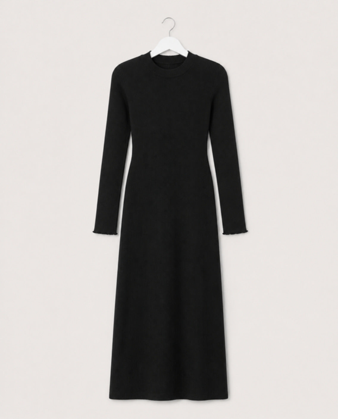 Image of The Don't Stare Dress in black by Callista, front view on an invisible mannequin | فستان دونت ستير أسود من كاليستا، صورة أمامية